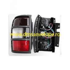 LAMPA SPATE Mitsubishi Pajero II 1998-2005 ( PRET PT 1 BUCATA )